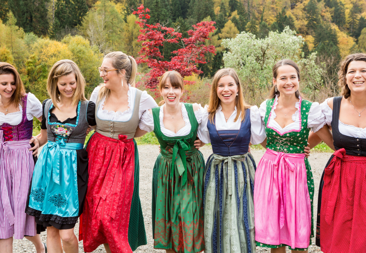 Group of women wearing authentic Dirndl in a range of colours at Oktoberfest